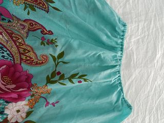 Falda floral turquesa