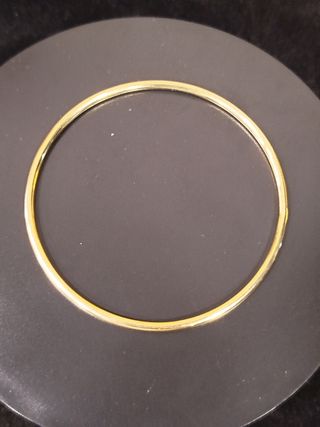 Pulsera oro 18k  rígida y maciza .7 cm diámetro 