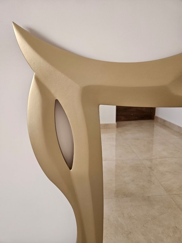 Espejo dorado moderno