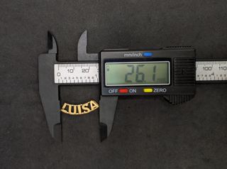 Colgante Nombre Luisa de oro de 18k, 0.95 g.