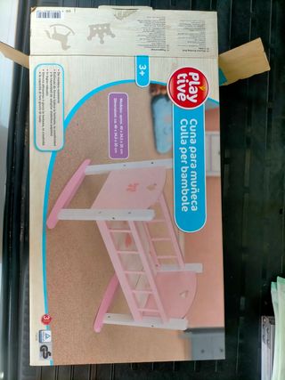 Cuna de madera juguetes