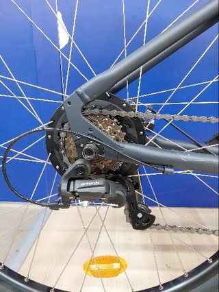 Bicicleta eléctrica trekking cuadro bajo Riverside 100 E