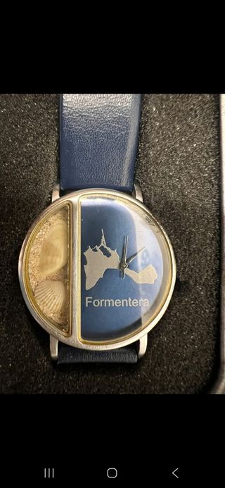 Orologio  blu e argento