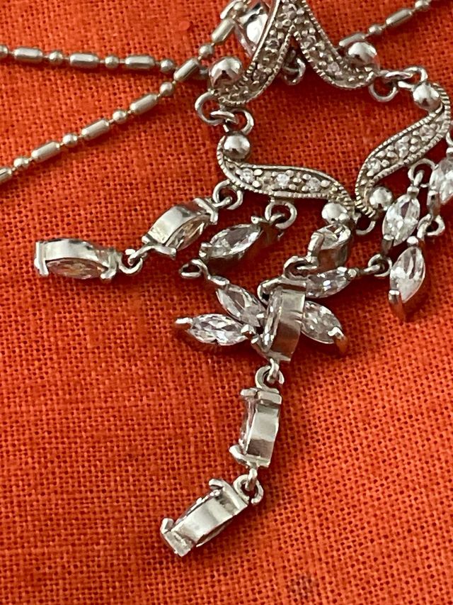 Parure argento: collana e orecchini platino