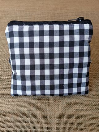 Cartera, bolso de mano, neceser.