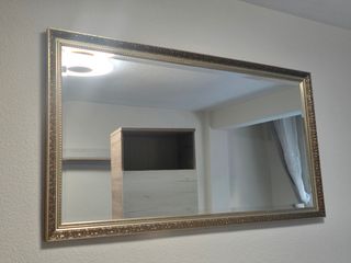 Espejo dorado salón