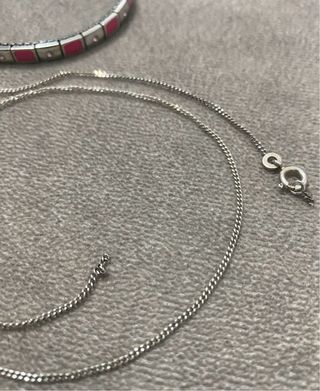 Bracciale in acciaio e 2 collane in argento