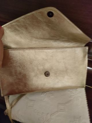 Vera Pelle Pochette Oro usato una volta sola