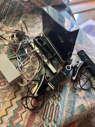 Wii + 2 mandos + 5 juegos