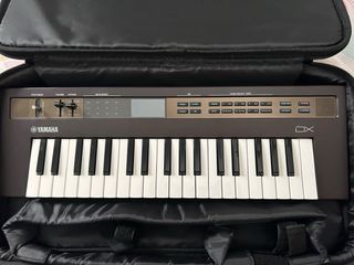 Sintetizador Yamaha reface DX y funda original