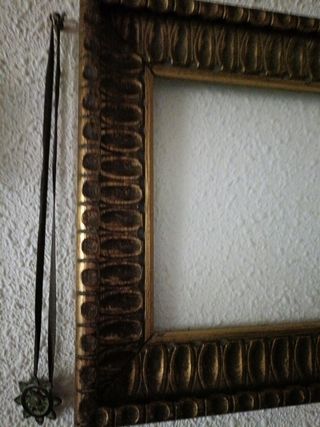 Marco antiguo dorado madera.Pn de oro.Con cristall