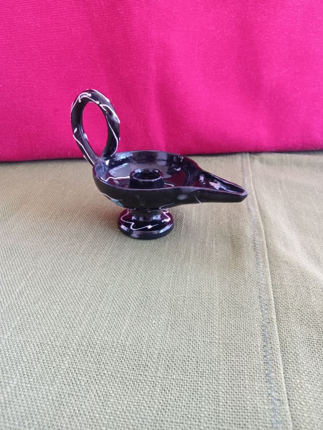 Vecchia bugia ceramica smaltata