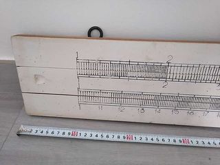 REGLA DE CALCULO DE FORMACION PARA COLGAR EN PARED