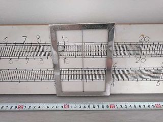 REGLA DE CALCULO DE FORMACION PARA COLGAR EN PARED