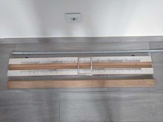 REGLA DE CALCULO DE FORMACION PARA COLGAR EN PARED