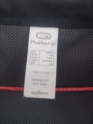 Chaqueta Kalenji gris oscuro ,cortavientos.
