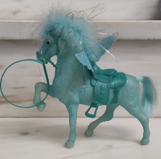 Caballo alado brillante azul