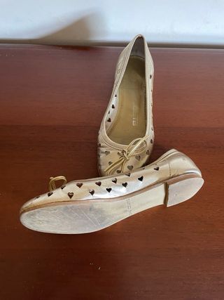 Zapatos niña Costa dorados
