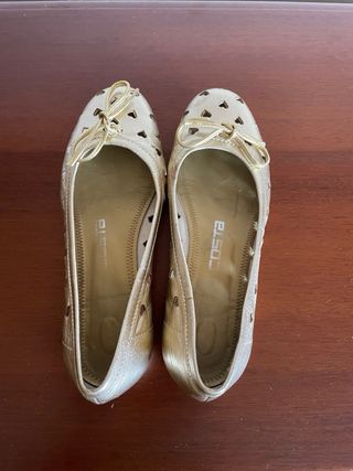 Zapatos niña Costa dorados
