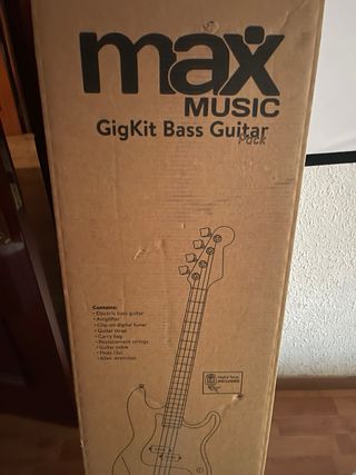 Bajo eléctrico blanco nuevo en su caja 