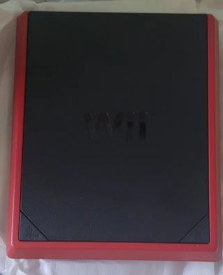 Wii mini rossa + 2 giochi