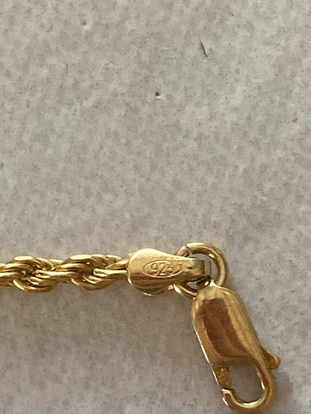 Bracciale intrecciato di argento dorato