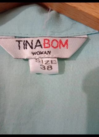 Blusa turquesa cruzada nueva