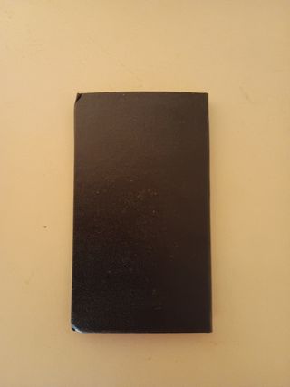Libreta antigua con cubierta plateada
