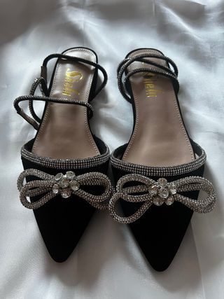 Scarpe nere con fiocco glitter