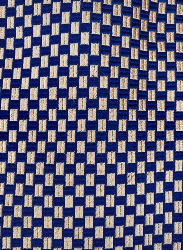 Corbata seda cuadros negro-naranja con apenas uso.