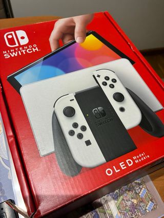 Nintendo Switch OLED - Blanca y Negra