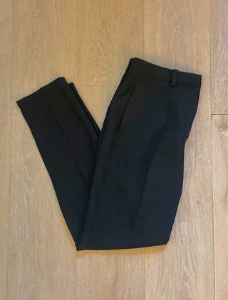 Pantalón traje pinzas negro mujer