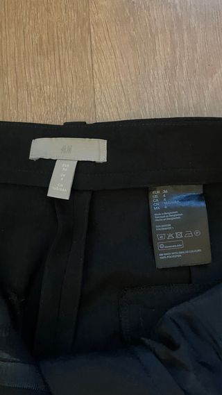 Pantalón traje pinzas negro mujer