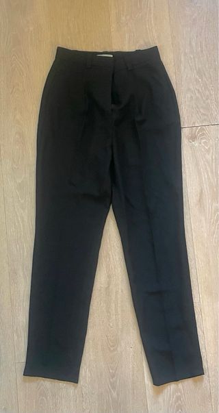 Pantalón traje pinzas negro mujer