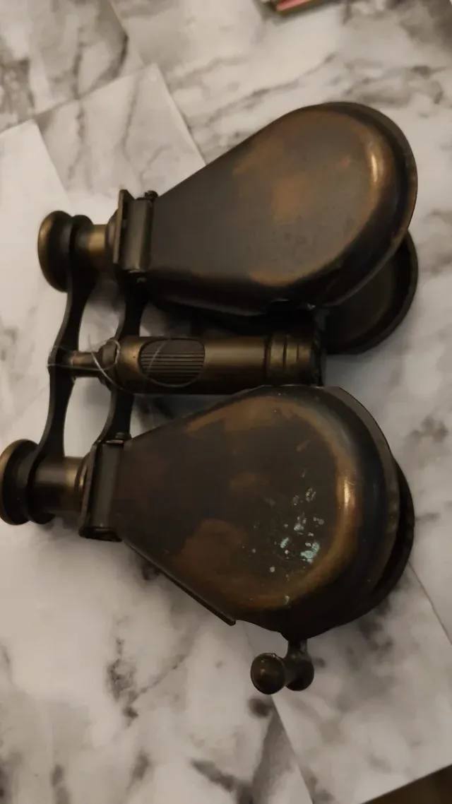 Prismáticos antiguos de latón