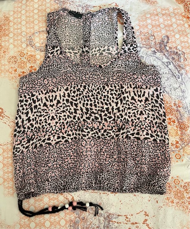 Blusa sin mangas -estampado animal print