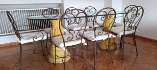 Vendita di 8 sedie e 2 panche in ferro battuto