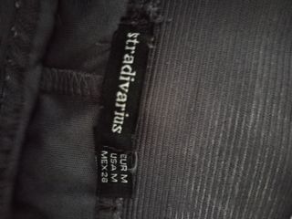 Falda gris plumas