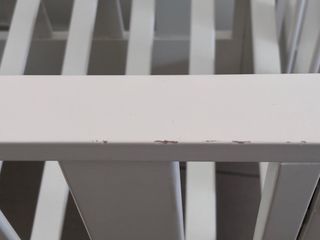 Minicuna blanca con ruedas