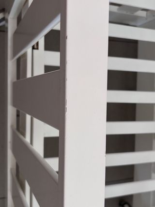 Minicuna blanca con ruedas