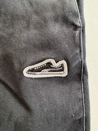 Bermuda Puma neri con logo sneaker – Taglia S