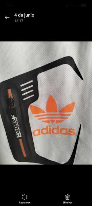 Camiseta Adidas blanca y naranja