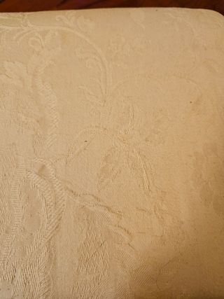 Poltrona in tessuto bianco avorio
