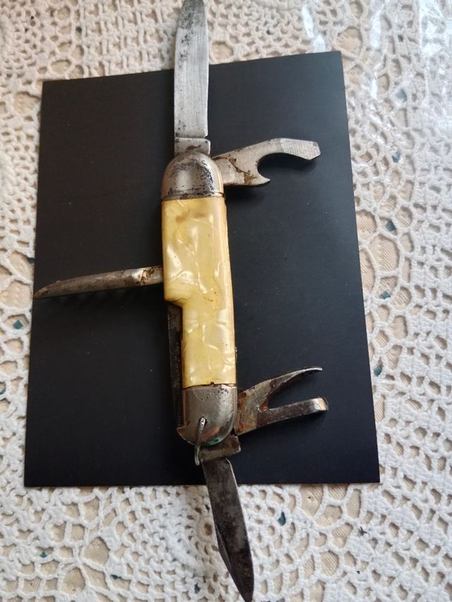 Vecchia navetta con manici in madreperla