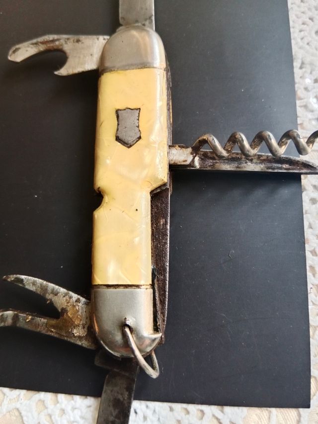 Vecchia navetta con manici in madreperla