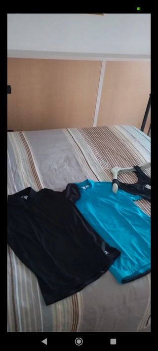 2 Magliette sportive: nera e turchese
Taglia M