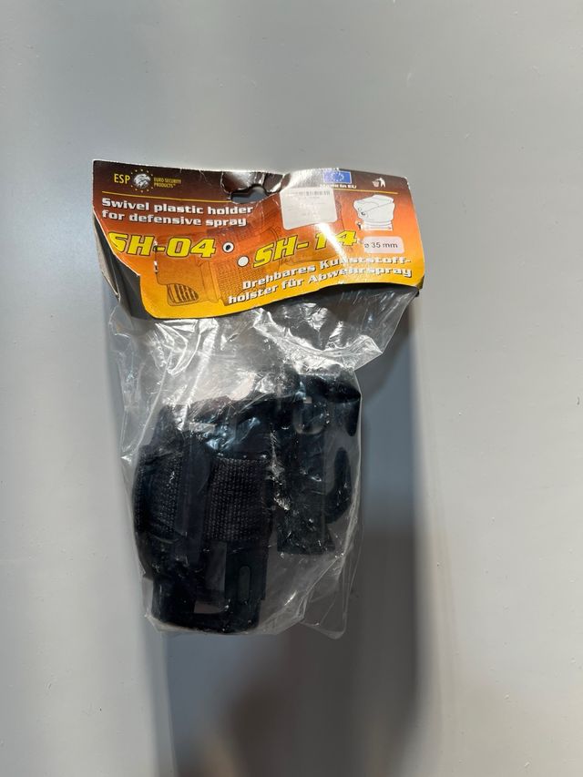 Soporte giratorio spray defensa