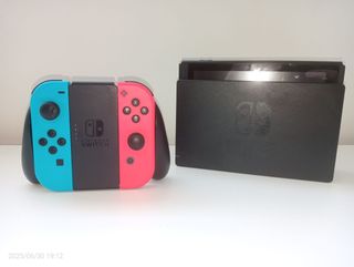Nintendo Switch + funda, 2 juegos