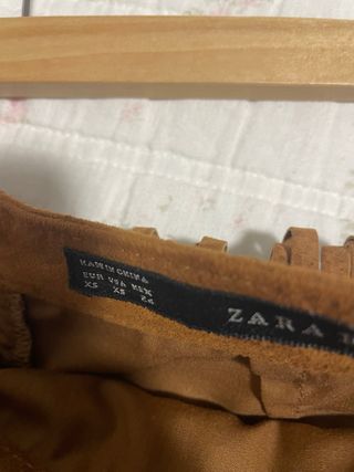 Falda marrón flecos piel autentica