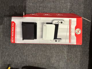 Nintendo Switch OLED - Blanca y Negra